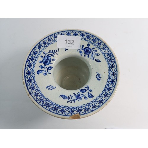 132 - A Delft spittoon painted stylised decoration, 13.5cm, chipped