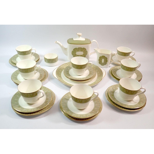 100 - A Royal Doulton Sonnet tea service comprising eight cups and seven saucers, teapot, sugar, jug, cake... 