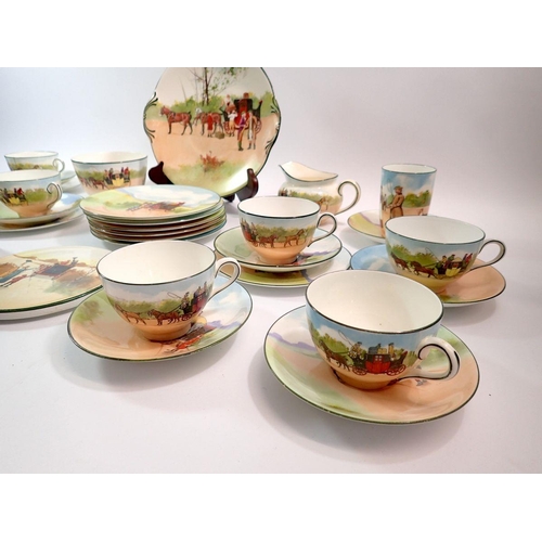 101 - A group of Royal Doulton Coaching Scenes tea ware comprising nine cups, ten saucers, teapot stand, s... 