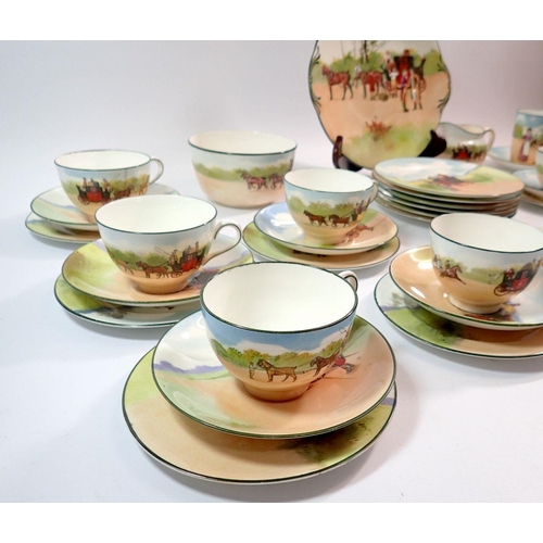 101 - A group of Royal Doulton Coaching Scenes tea ware comprising nine cups, ten saucers, teapot stand, s... 