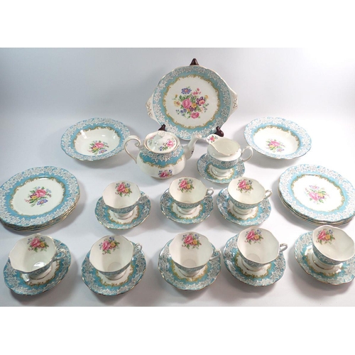 108 - A Royal Albert Enchantment tea service comprising teapot, eight cups and saucers, eight tea plates, ... 