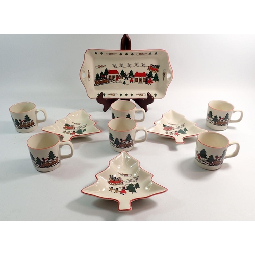 110 - A Masons Christmas Village dinner service comprising eleven dinner plates, eighteen side plates, sev... 