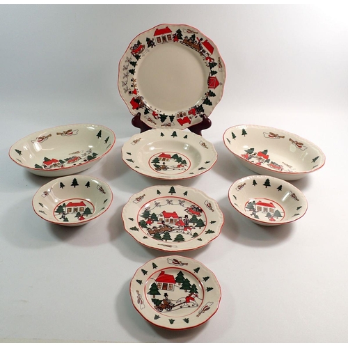 110 - A Masons Christmas Village dinner service comprising eleven dinner plates, eighteen side plates, sev... 