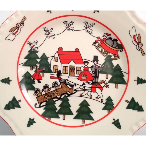 110 - A Masons Christmas Village dinner service comprising eleven dinner plates, eighteen side plates, sev... 