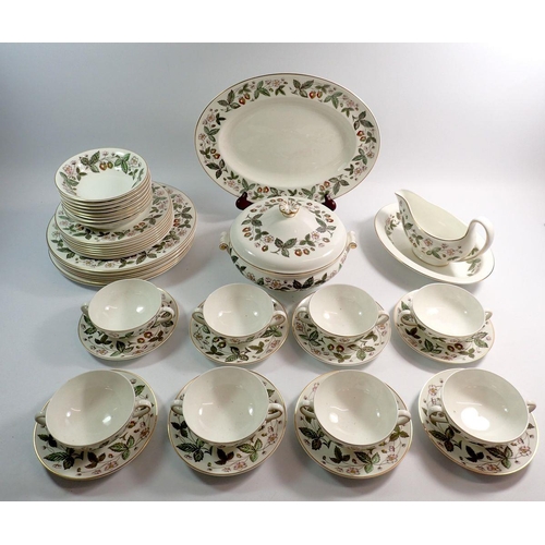 111 - A Wedgwood Strawberry Hill dinner service comprising eight dinner plates, eight side plates, eight b... 