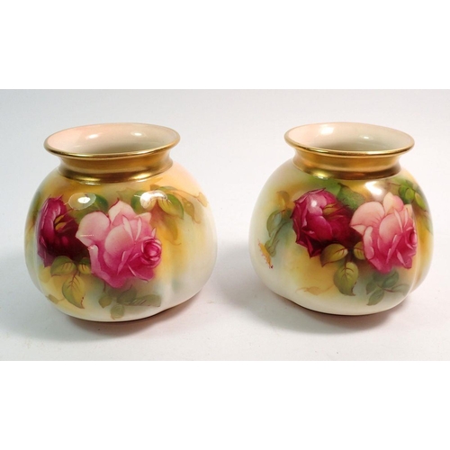 115 - A pair of Royal Worcester posy vases painted roses signed Millie Hunt No 158, 8.5cm