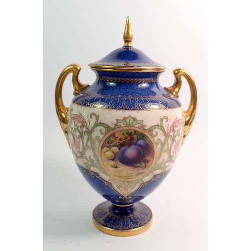 125 - A Royal Worcester urn form vase and cover painted still life fruit by Horace Price, 21.5cm