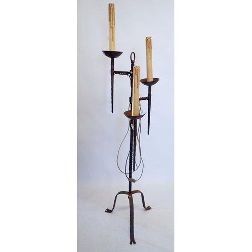 1254 - An Arts & Crafts style wrought iron standard lamp with three branches, 144cm