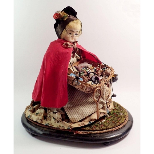 1260 - A large Victorian wax headed peddler doll with tray of wares, under glass dome, approx 48cm