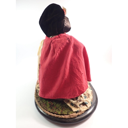 1260 - A large Victorian wax headed peddler doll with tray of wares, under glass dome, approx 48cm