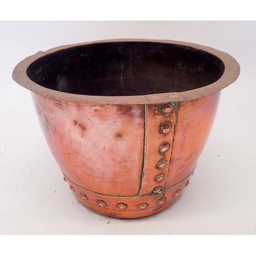 1264 - A copper log bin with riveted decoration, 46cm diameter, 32cm high