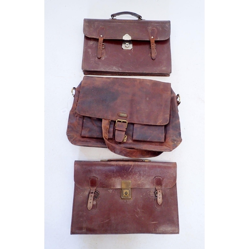 1267 - Three brown leather briefcases, largest 48cm wide