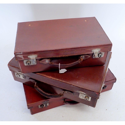 1273 - Three small brown leather suitcases, largest 50.5cm wide