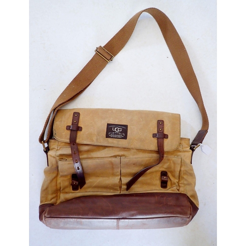 1276 - An Ugg canvas and brown leather messenger bag, 42cm wide