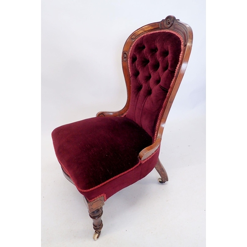 1279 - A Victorian red upholstered chair with incised decoration on turned supports