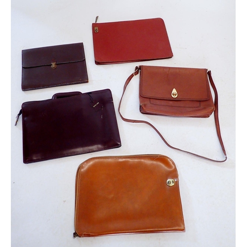 1280 - Five various brown leather folio cases and messenger bags, largest 40cm wide