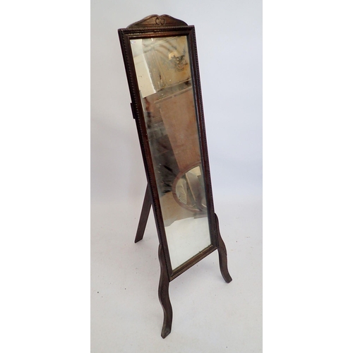 1294 - An oak cheval mirror with easel supports, 135cm high