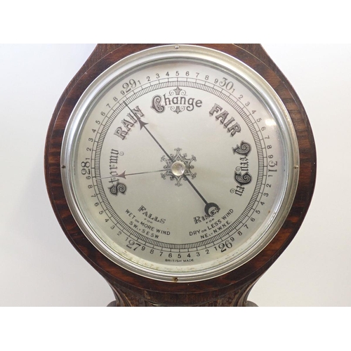 1296 - A Victorian carved oak barometer/thermometer,  80cm long