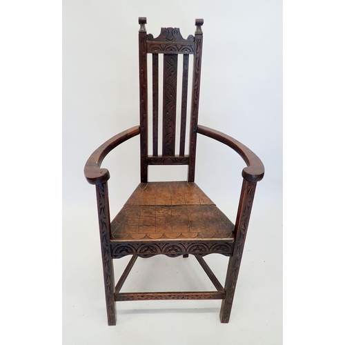 1298 - A 19th century oak caquetoire chair with carved and incised decoration