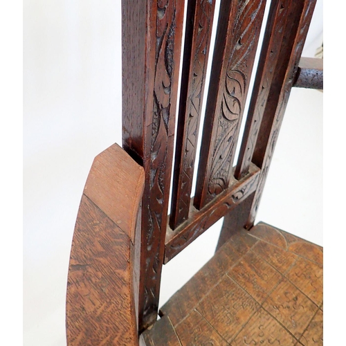 1298 - A 19th century oak caquetoire chair with carved and incised decoration