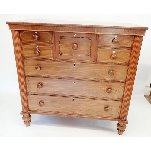 1299 - A Victorian mahogany Scotch chest with hat drawer flanked by four small drawers over three long draw... 