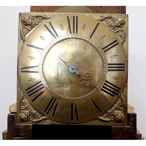 1303 - An early 18th century oak longcase clock, the brass dial with one hand and angel mask spandrels, by ... 