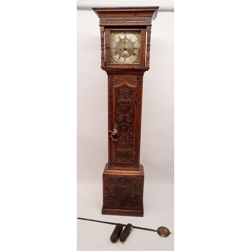 1329 - An 18th century oak longcase clock, the brass dial with date niche and seconds dial, with eight day ... 