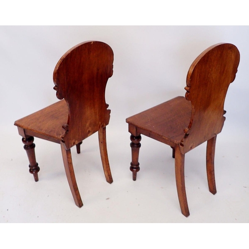 1330 - A pair of Victorian oak shield back hall chairs