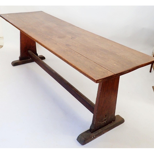 1335 - A Victorian oak trestle table, 67cm wide x 213cm long x 75cm high