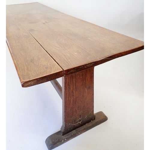 1335 - A Victorian oak trestle table, 67cm wide x 213cm long x 75cm high