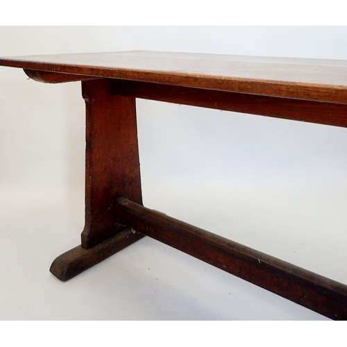 1335 - A Victorian oak trestle table, 67cm wide x 213cm long x 75cm high