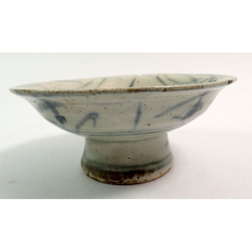 134 - An antique Chinese blue and white provincial small porcelain pedestal dish, 10cm diameter