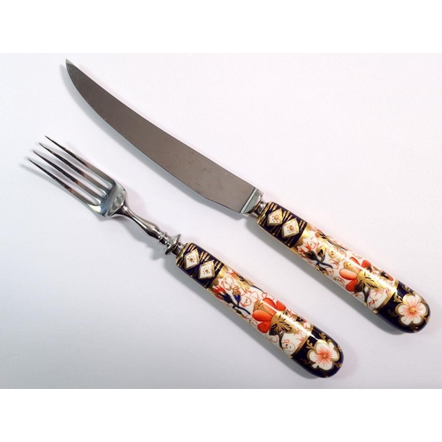 138 - A cased set of Royal Crown Derby Imari knives and forks with Imari handles