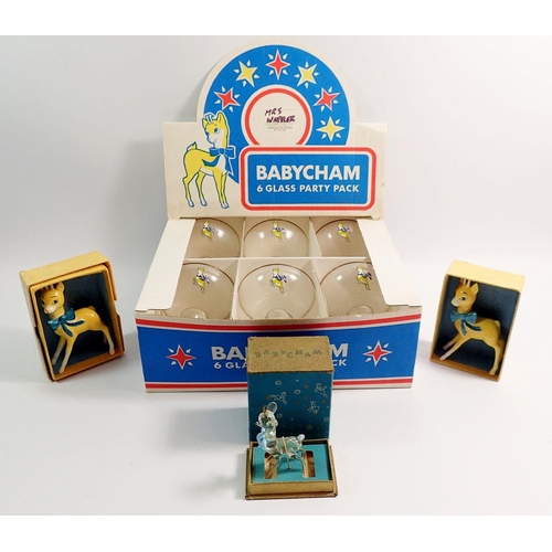 140 - Six Babycham glasses, two ceramic deers and a glass deer in original box