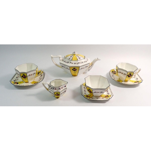 18 - A Shelley Art Deco bachelor tea service painted fruit on yellow and white reserves, No. 11511, compr... 