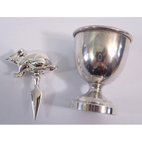 227 - A silver mouse cheese pick, 4.5cm wide and silver egg cup, 50g