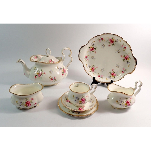 23 - A Royal Albert 'Tenderness' tea service comprising teapot, milk and sugar, six tea cups, saucers and... 