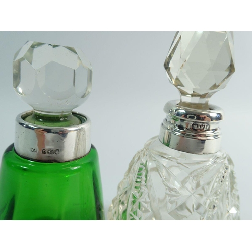 233 - Two silver collared glass perfume bottles, largest 11cm