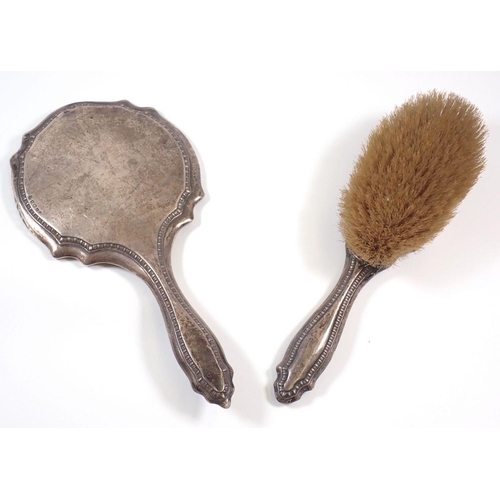 245 - A silver backed brush and mirror