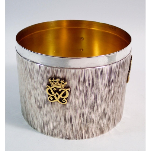 250 - A silver commemorative tea caddy made by Carrington for Queen Elizabeth II silver wedding anniversar... 