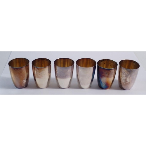 251 - A set of six modern sterling silver and silver gilt shot glasses, maker IM, 98g, 4.8cm high