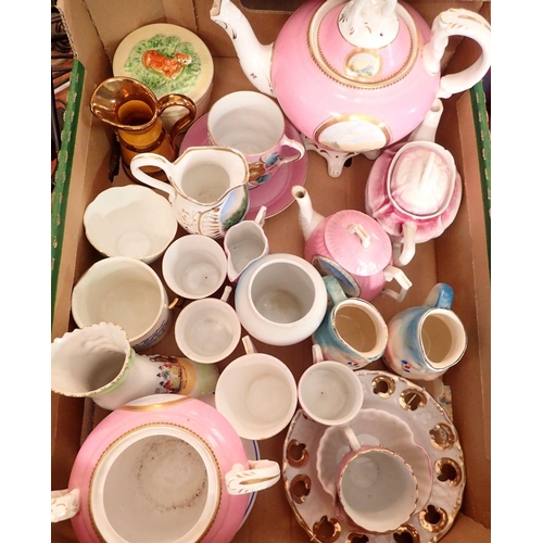 27 - A box of souvenir ceramics including Barry Island, Weston-super-Mare etc. teapots, jugs, cups and sa... 