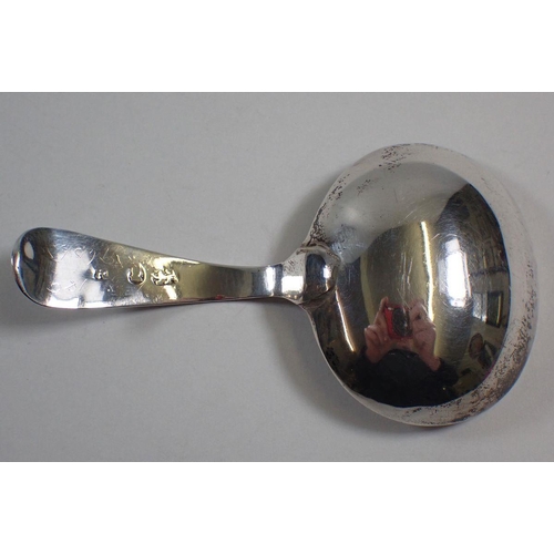 273 - A Georgian silver caddy spoon with bright cut decoration, 12g