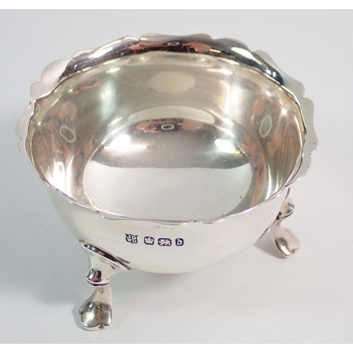 280 - A silver salt with wavy rim and three hoof feet by James Dixon, Sheffield 1896