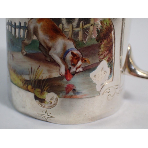 284 - A Victorian silver christening mug by Charles Edwards inset Aesop's Fables enamelled scene of a dog,... 