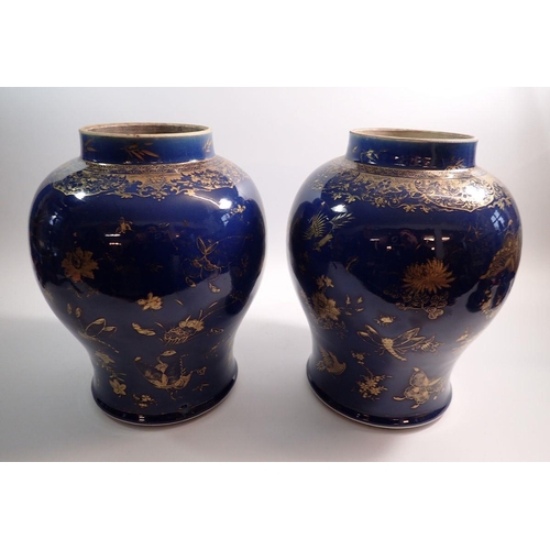 29 - A pair of Chinese Qing dynasty powder blue vases and covers painted gilt insect, flower and bird dec... 