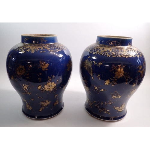 29 - A pair of Chinese Qing dynasty powder blue vases and covers painted gilt insect, flower and bird dec... 