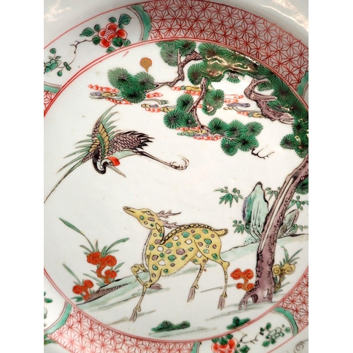 30 - A Qing dynasty Chinese Famille Verte charger painted sika deer with crane, the border with six crane... 