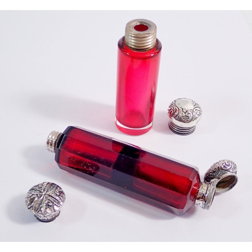 312 - A Victorian red double ended glass scent bottle with white metal mounts, 10.5cm and a cranberry glas... 