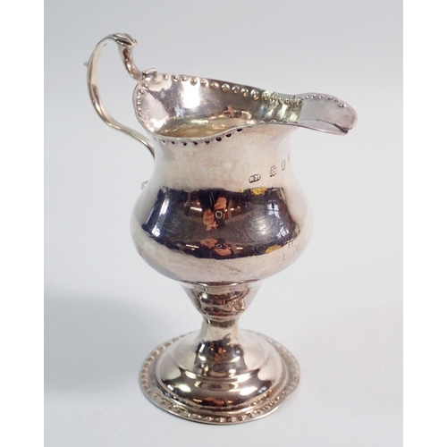 320 - A George III silver cream jug with punched borders, London 1783 by Benjamin Mountigue, 10.5cm tall, ... 